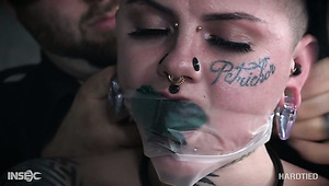 Almost crucified right above the floor Luna LaVey gets twat masturbated