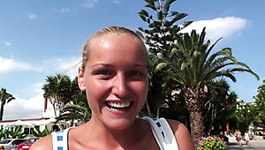 Foxy blond MILF dives in sky blue water wearing diving costume