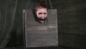 Hard tied brunette girl with shocked face