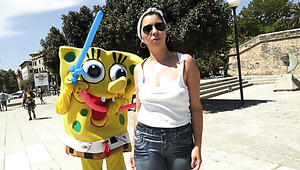 Skanky brunette in sunglasses is damn proud of her sexy body