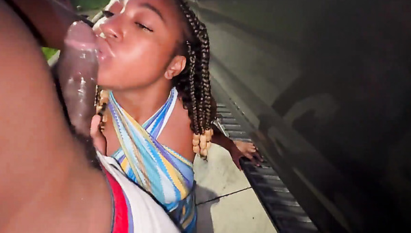 Horny braided ebony wife sucks trucker cock in public parking lot like a total slut